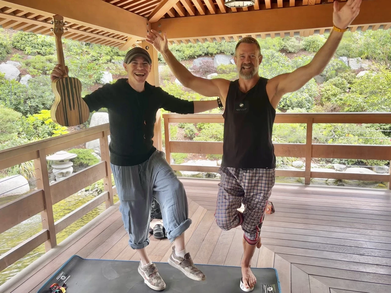 Ryan Today and Miles Lukas standing together on one leg after co-hosting a balance and breathwork class